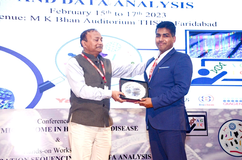 Dr. Rajkumar Halder receiving award